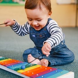 baby playing xylophone