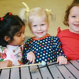 little girls on xylophone